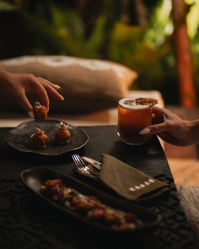 Cocktail, small bites, and sharing plates served at Kaban Bali restaurant and bar with garden inspired ambiance