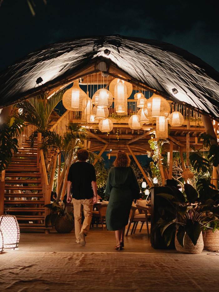 Guests gathered in the garden at KABAN Restaurant Bali during the grand opening in Umalas, September 2025.